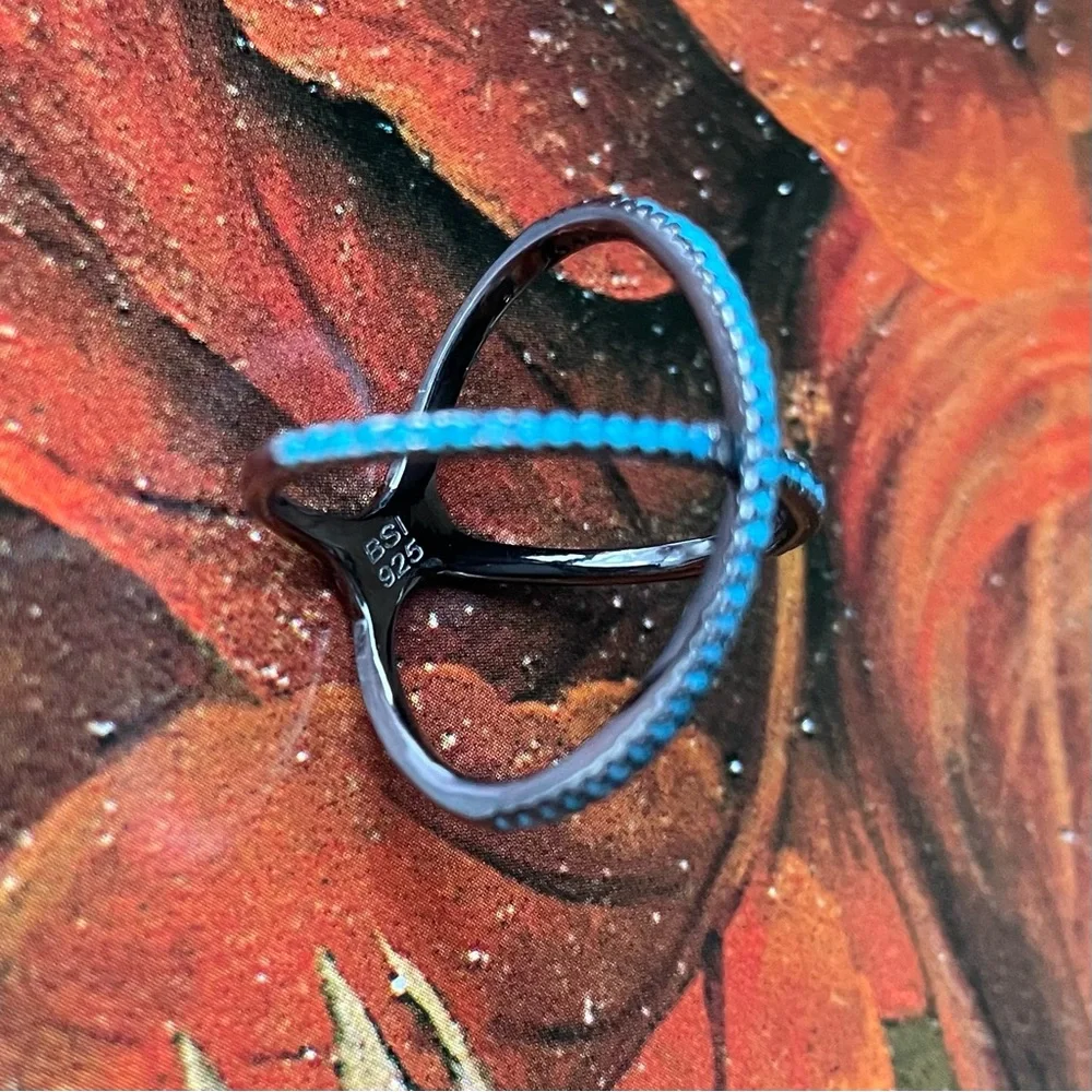 Crossed Sterling Silver Ring with Faceted Blue Crystals gunmetal 925